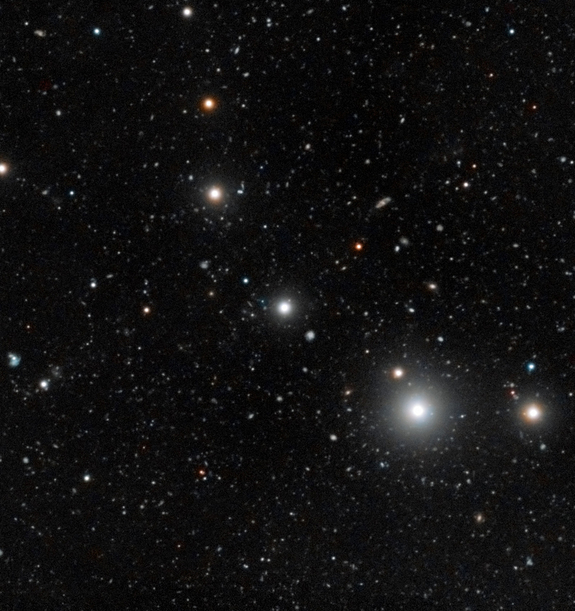 This deep image shows the region of the sky around the quasar HE0109-3518. The quasar is near the center of the image. The energetic radiation of the quasar makes dark galaxies glow, helping astronomers to understand the obscure early stages of galaxy formation.