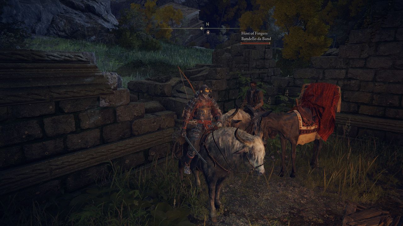 Two players mounted on torrent hanging out by merchant Kale's beast of burden