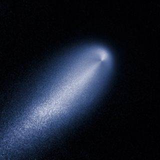This contrast-enhanced, computer-processed image was produced from photos of Comet ISON taken by NASA's Hubble Space Telescope on April 10, 2013, when the comet was 386 million miles from the sun.