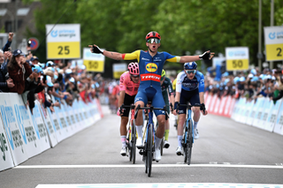 RUSCHLIKON, SWITZERLAND - JUNE 11: Thibau Nys of Belgium and Team Lidl - Trek celebrates at finish line as stage winner ahead of (L-R) Alberto Bettiol of Italy and Team EF Education-EasyPost and Stephen Williams of The United Kingdom and Team Israel - Premier Tech during the 87th Tour de Suisse 2024, Stage 3 a 161.7m stage from Steinmaur to Ruschlikon / #UCIWT / on June 11, 2024 in Ruschlikon, Switzerland. (Photo by Tim de Waele/Getty Images)