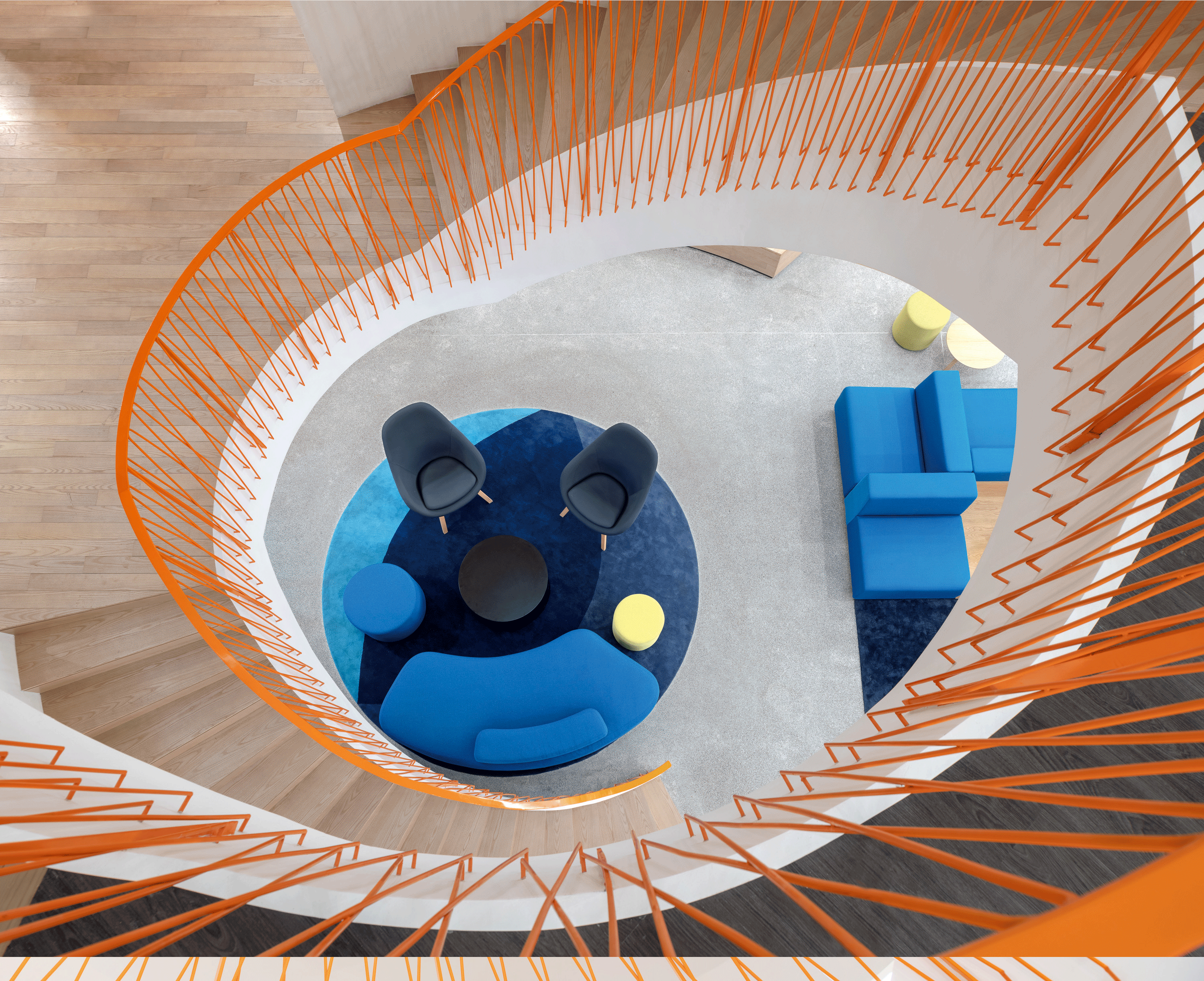 The Ippolito Fleitz Group is behind this dramatic colourful staircase in Shanghai's SOHO 3Q WuJiaoChang workspace