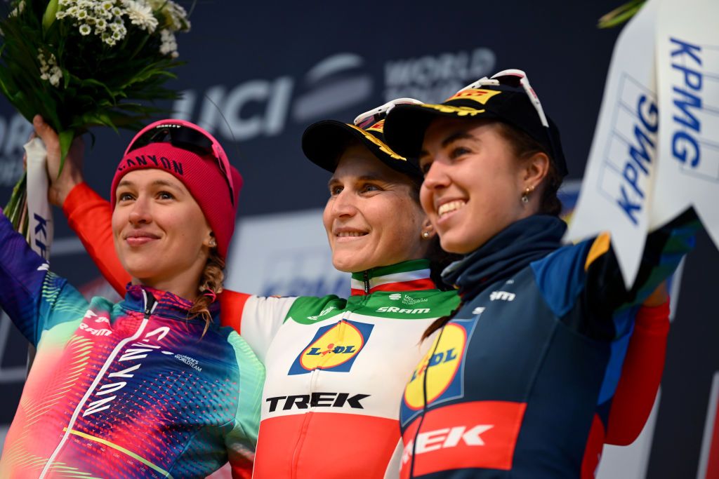 OUDENAARDE BELGIUM MARCH 31 LR Katarzyna Niewiadoma of Poland and Team CanyonSRAM Racing on second place race winner Elisa Longo Borghini of Italy and Team Lidl Trek and Shirin Van Anrooij of The Netherlands and Team Lidl Trek on third place pose on the podium ceremony after the during the 21st Ronde van Vlaanderen Tour des Flandres 2024 Womens Elite a 163km one day race from Oudenaarde to Oudenaarde UCIWWT on March 31 2024 in Oudenaarde Belgium Photo by Dario BelingheriGetty Images