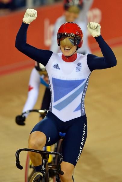 Britain's Victoria Pendelton celebrates after crossing the finish line to win the gold medal in the London 2012 Olympic Games women's Keirin final
