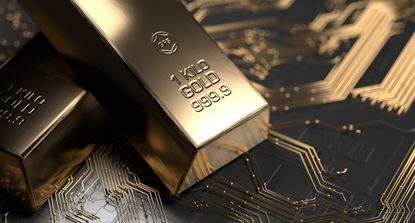 Gold bars on a circuitboard representing cryptocurrency (crypto)