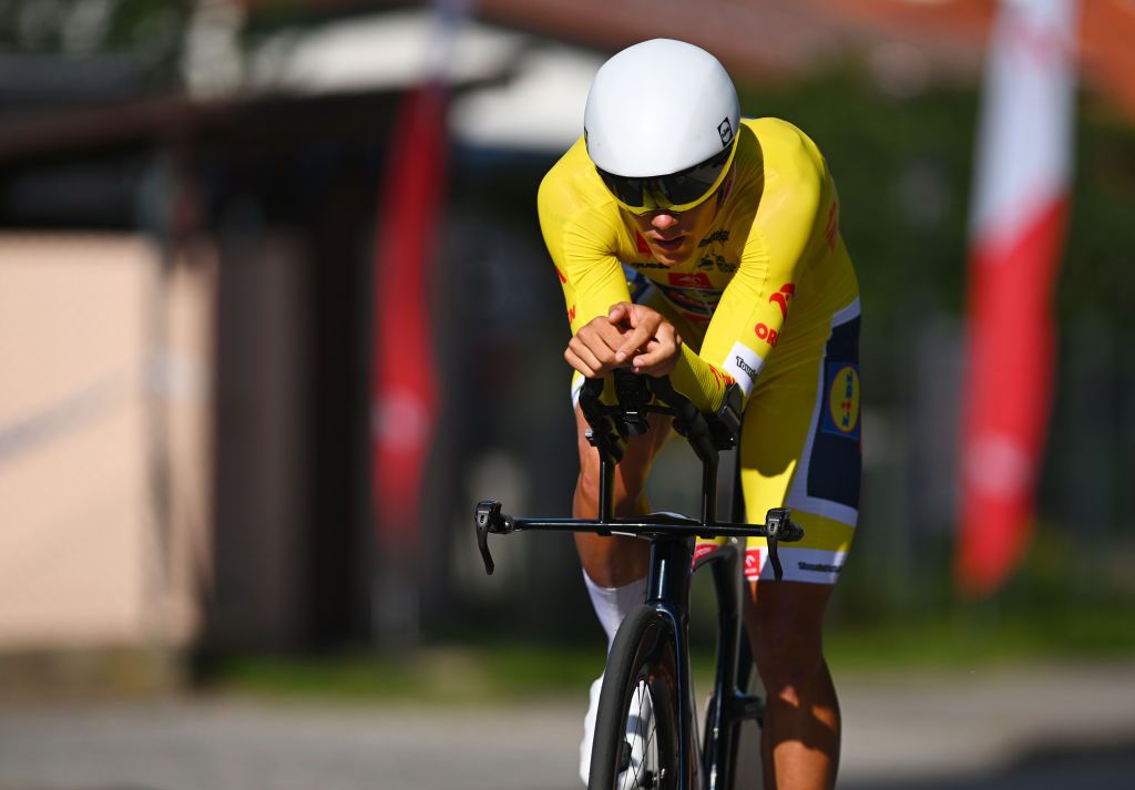 KARPACZ POLAND AUGUST 13 Thibau Nys of Belgium and Team LidlTrek Yellow leader jersey sprints during the 81st Tour de Pologne Stage 2 a 154km individual time trial stage from Mysakowice to Karpacz UCIWT on August 13 2024 in Karpacz Poland Photo by Luc ClaessenGetty Images