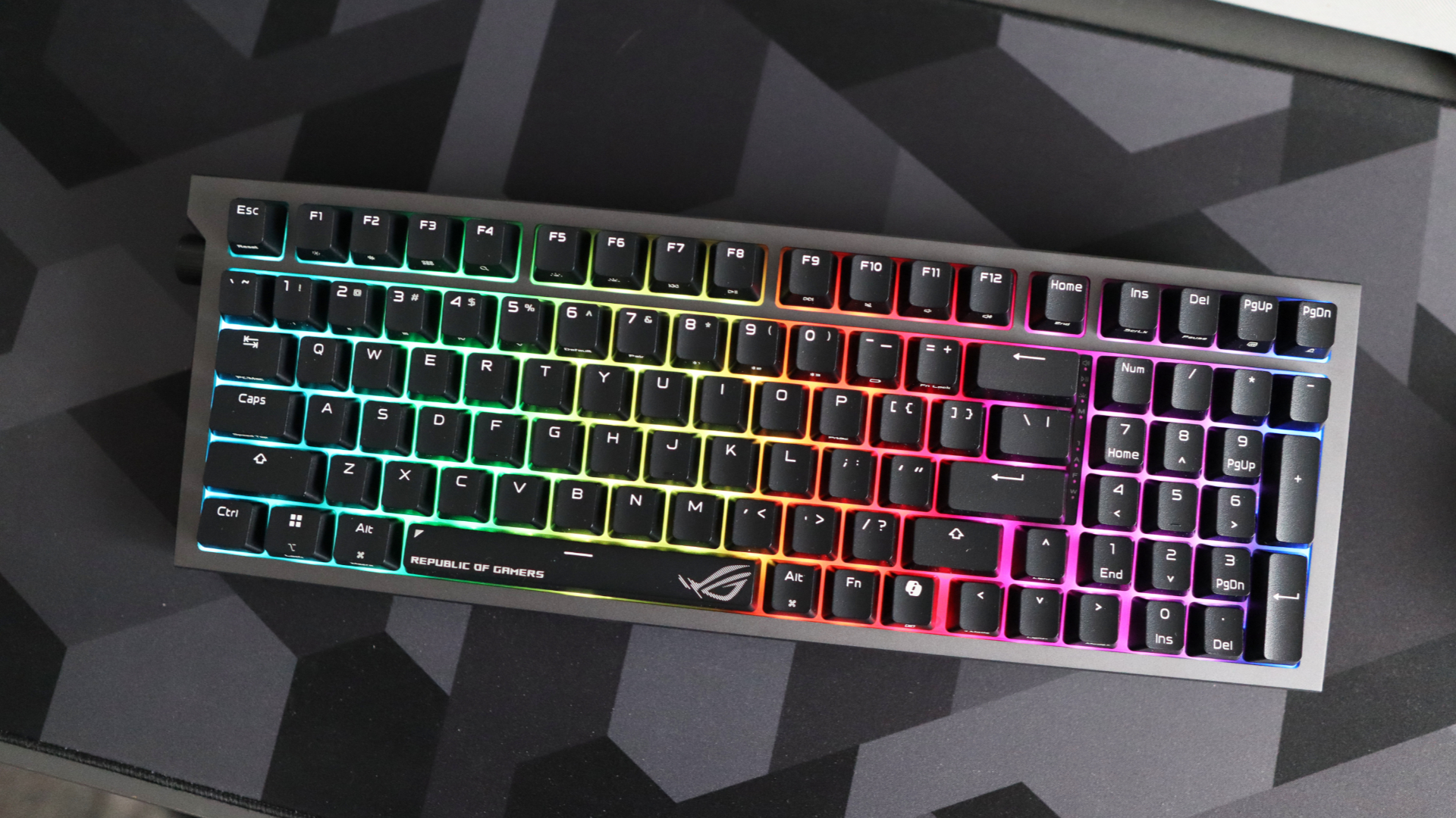 Asus ROG Strix Morph 96 Wireless on a desk mat.