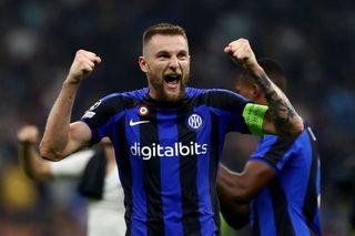 Milan Skriniar of FC Internazionale celebrates after their side's victory during the UEFA Champions League group C match between FC Internazionale and FC Barcelona at San Siro Stadium on October 04, 2022 in Milan, Italy.