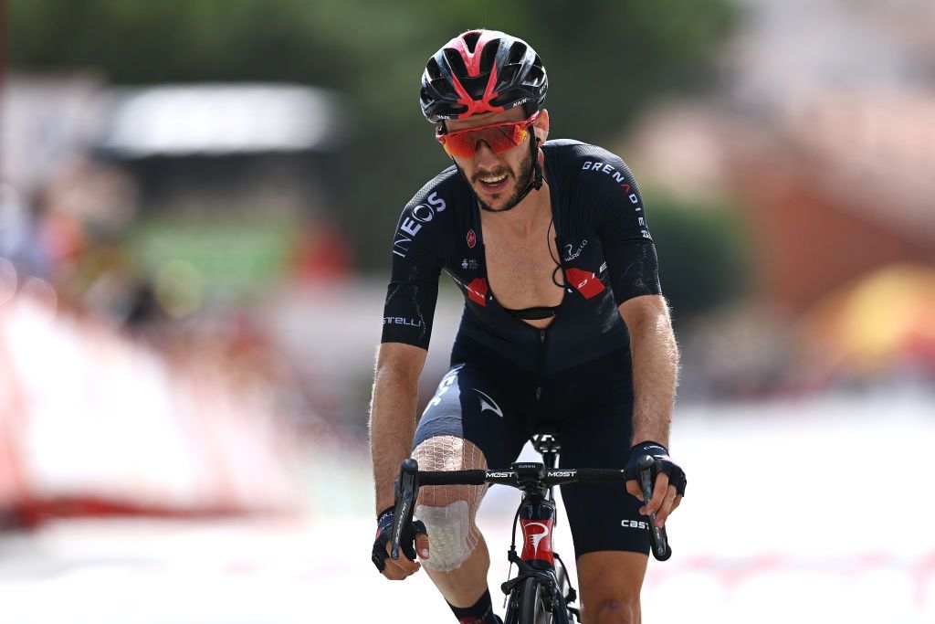 EL BARRACO SPAIN AUGUST 29 Adam Yates of United Kingdom and Team INEOS Grenadiers crosses the finishing line during the 76th Tour of Spain 2021 Stage 15 a 1975km km stage from Navalmoral de la Mata to El Barraco lavuelta LaVuelta21 on August 29 2021 in El Barraco Spain Photo by Stuart FranklinGetty Images