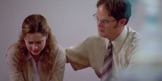 Dwight and Pam in the hallway in The Office.