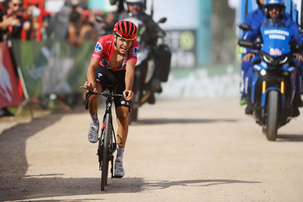 LES PRAERESNAVA SPAIN AUGUST 28 Remco Evenepoel of Belgium and Team QuickStep Alpha Vinyl Red Leader Jersey crosses the finish line during the 77th Tour of Spain 2022 Stage 9 a 1714km stage from Villaviciosa to Les Praeres Nava 743m LaVuelta22 WorldTour on August 28 2022 in Les Praeres Nava Spain Photo by Justin SetterfieldGetty Images