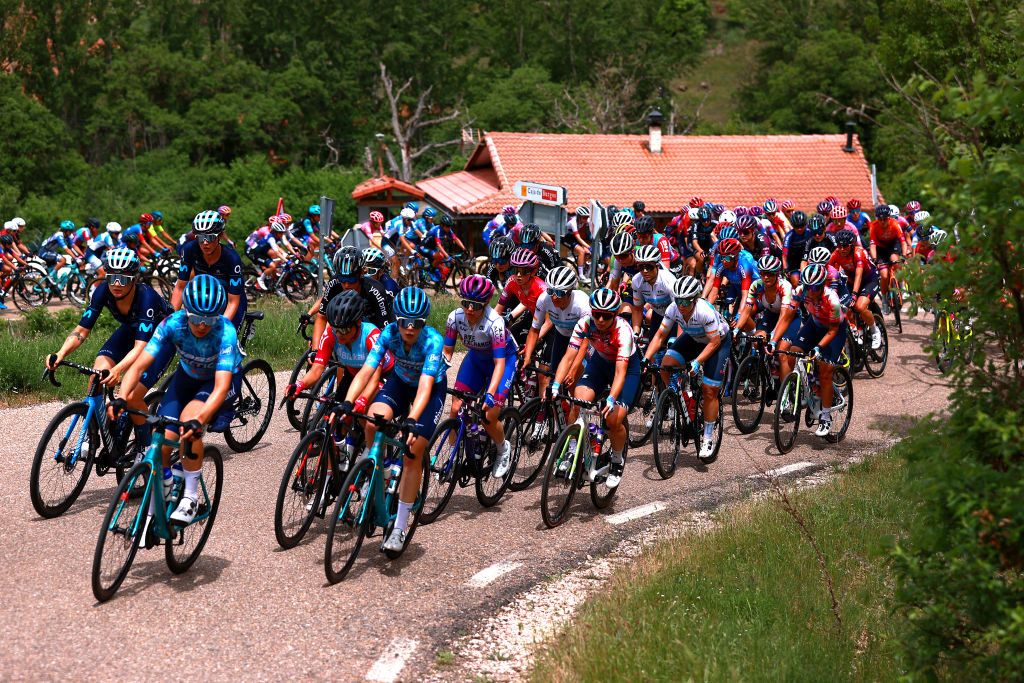 LAGUNAS DE NEILA SPAIN MAY 22 A general view of the peloton competing during the 7th Vuelta a Burgos Feminas 2022 Stage 4 a 1251km stage from Covarrubias to Lagunas de Neila 1867m VueltaBurgos BurgosFem UCIWWT on May 22 2022 in Lagunas de Neila Spain Photo by Gonzalo Arroyo MorenoGetty Images
