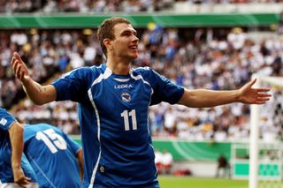 Edin Dzeko celebrates after scoring for Bosnia and Herzegovina against Germany in June 2010.