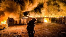 A handout photo made available by the State Emergency Service shows Ukrainian rescuers working at the site of the glide bomb attacks in Kupiansk, Kharkiv region, Ukraine, 11 April 2025, amid the ongoing Russian invasion.