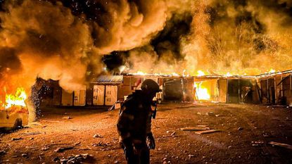 A handout photo made available by the State Emergency Service shows Ukrainian rescuers working at the site of the glide bomb attacks in Kupiansk, Kharkiv region, Ukraine, 11 April 2025, amid the ongoing Russian invasion.