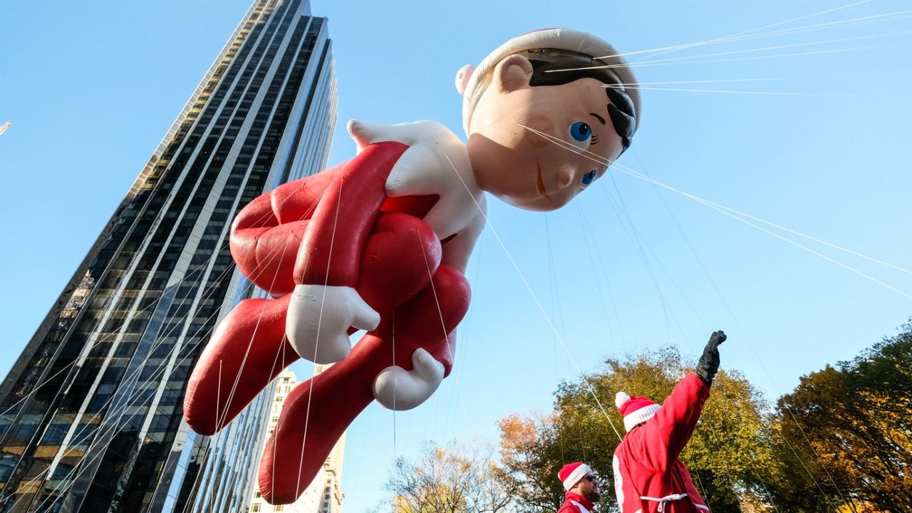 The Elf on the Shelf balloon floats in Columbus Circle during the 91st Annual Macy&amp;#039;s Thanksgiving Day Parade on November 23, 