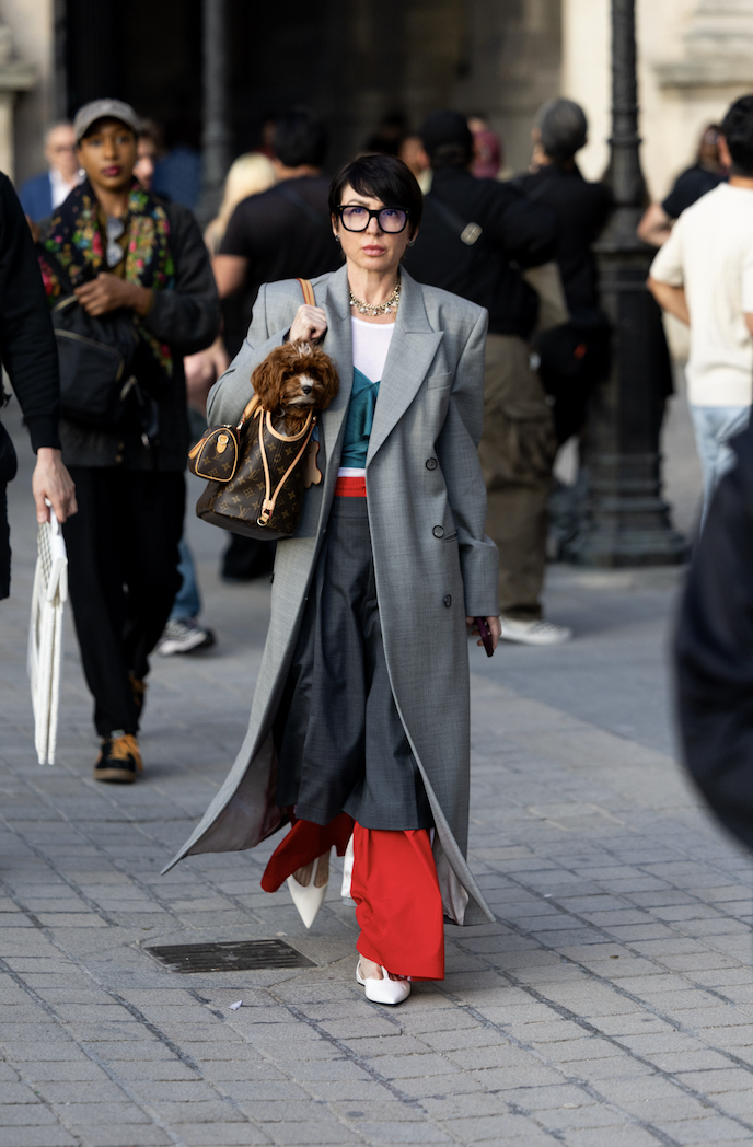 showgoer wearing red and gray color combination trend at Paris Fashion Week