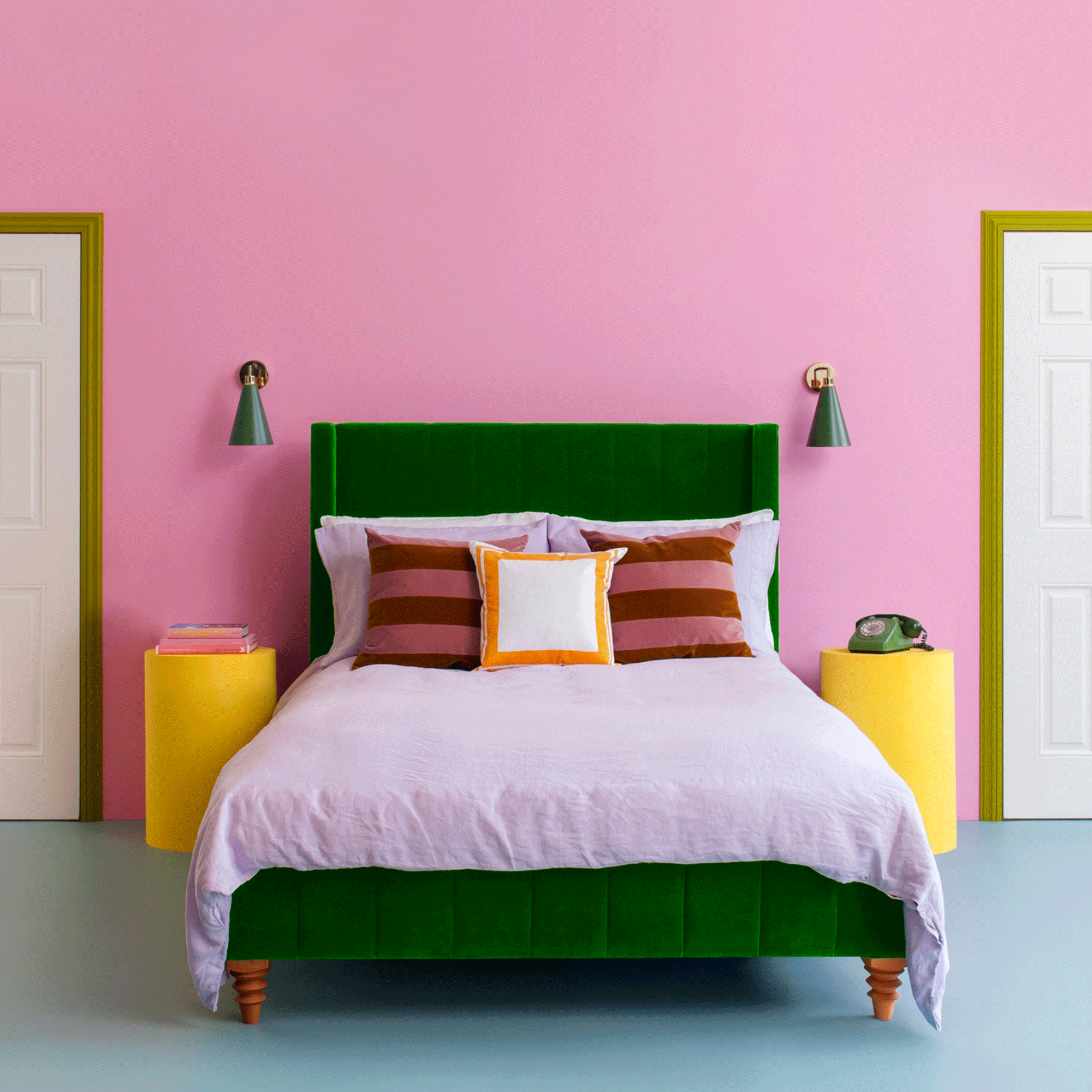 Pink bedroom with green bed