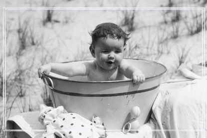 Baby names illustrate with black and white photo of baby in tub