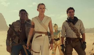 Star Wars: The Rise of Skywalker Finn Rey C3PO and Poe stand in the desert