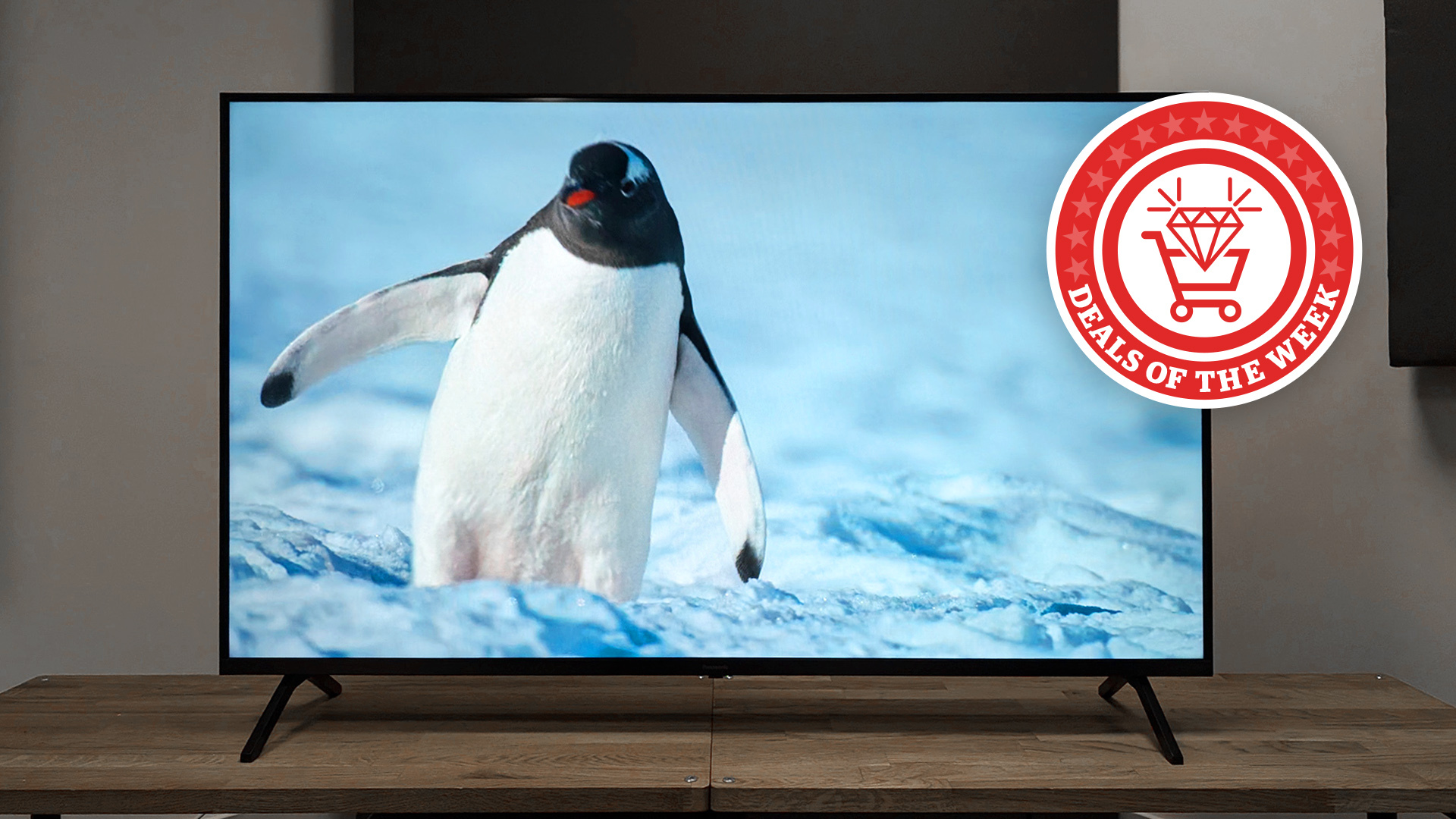An image of the Panasonic W90A TV showing a penguin, with the Deals of the Week logo overlaid on top