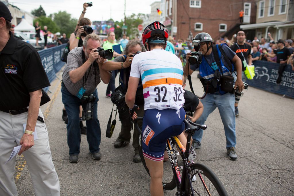 The photographers scramble to get a shot of Megan Guarnier after her win