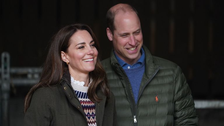 Catherine, Duchess of Cambridge and Prince William, Duke of Cambridge smile during a royal visit to Manor Farm in