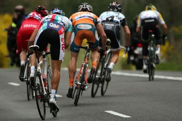 The remnants of the day's break react as Jack Bobridge mounts another attack