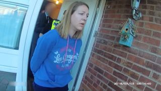 A screenshot from a Police body-camera video, provided by Chestire Constabulary, showing Lucy Letby being arrested .