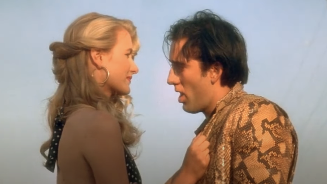 Nicholas Cage y Laura Dern al final de Corazón salvaje