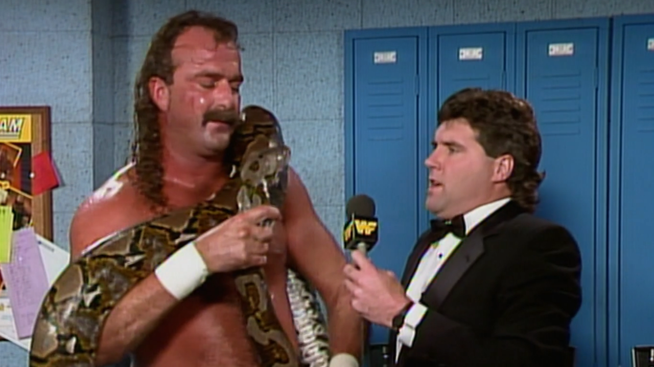 Jake The Snake Roberts giving an interview with his snake.