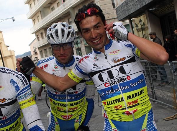 Stage winner Giuseppe Muraglia (CDC Cavaliere), right, spreads the good news.