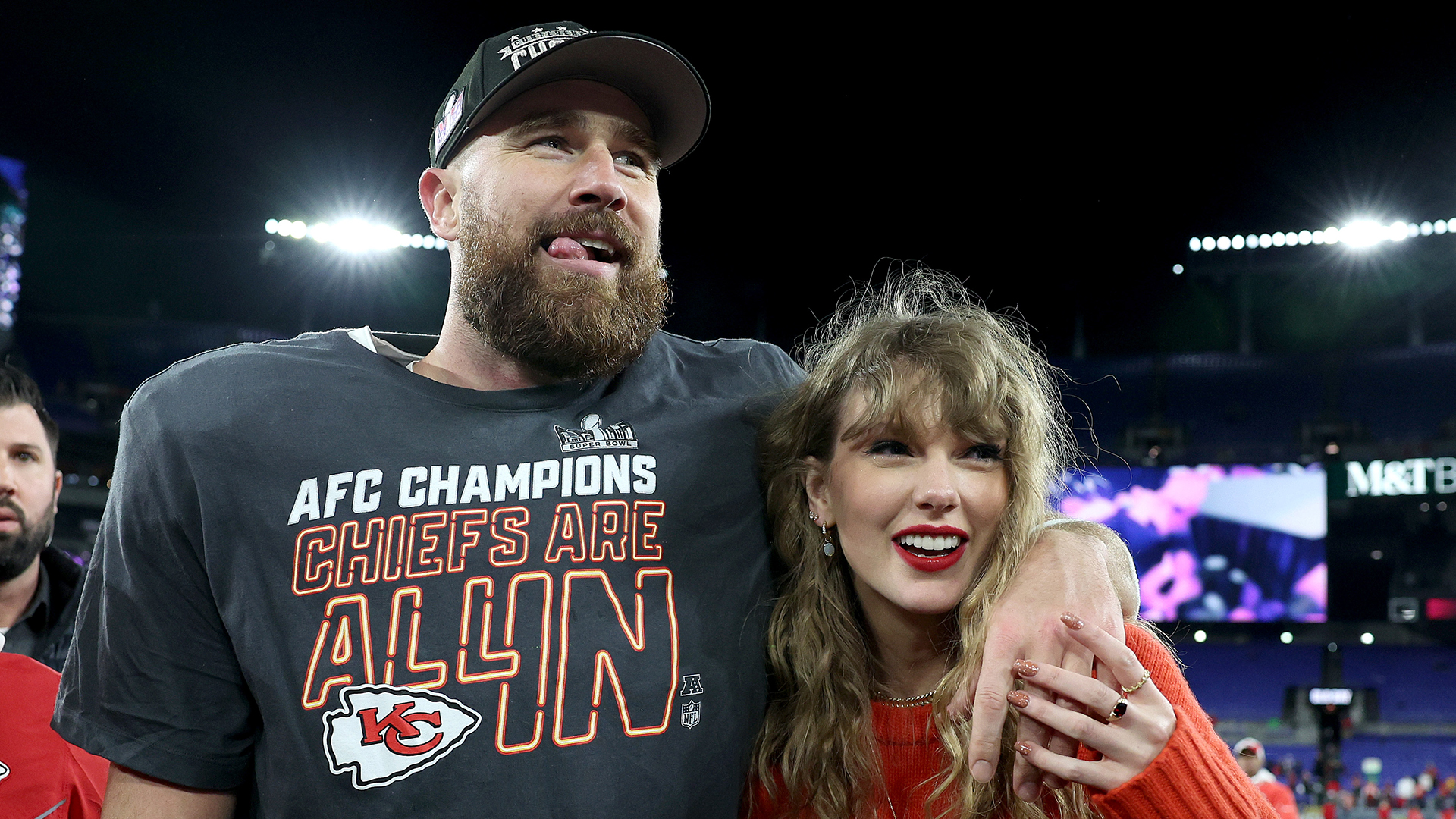 Travis Kelce of the Kansas City Chiefs celebrates with Taylor Swift after a 17-10 victory against the Baltimore Ravens in the AFC Championship Game at M&amp;T Bank Stadium on January 28, 2024 in Baltimore, Maryland.