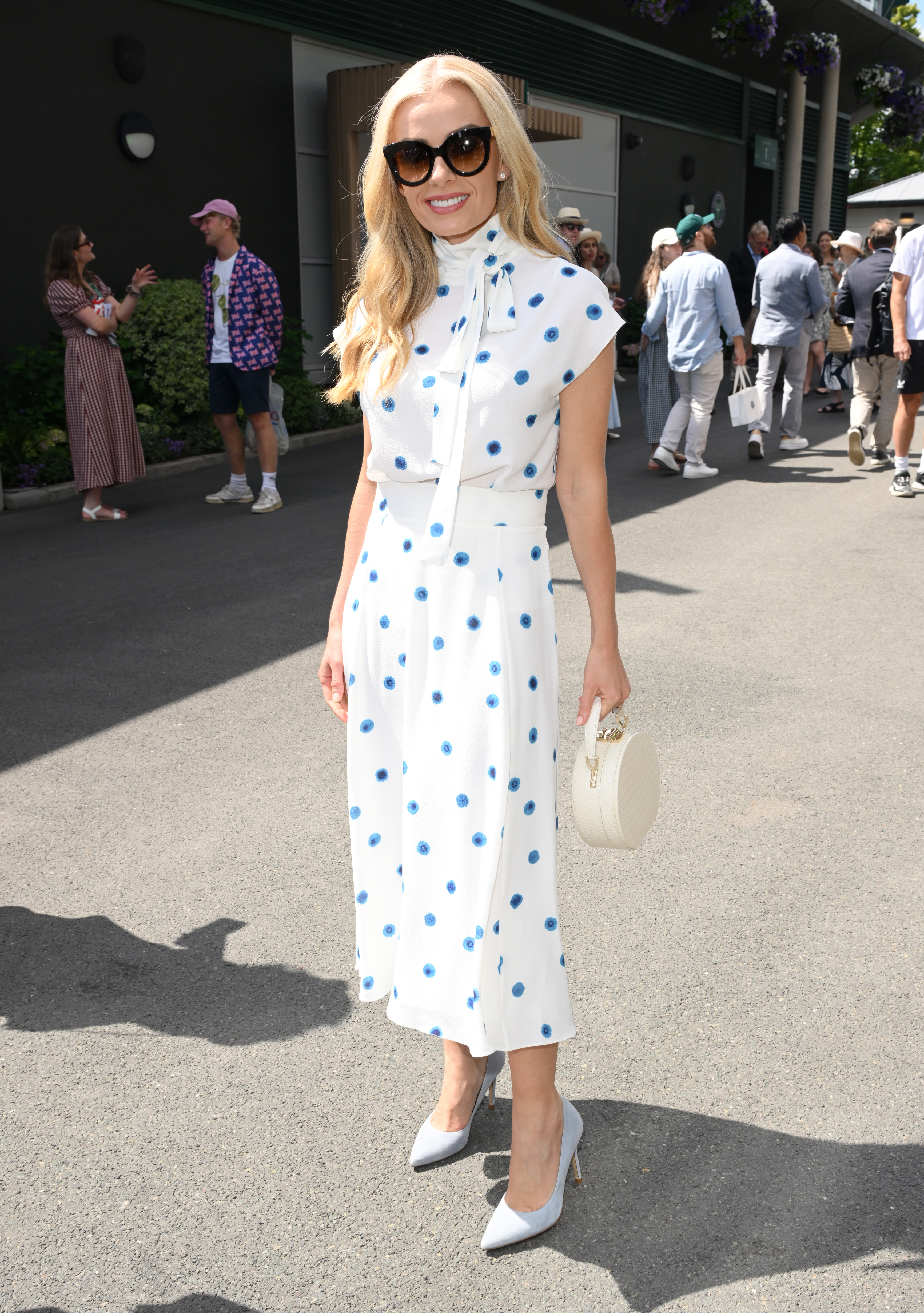 Katherine Jenkins white dress with blue polka dot style spots