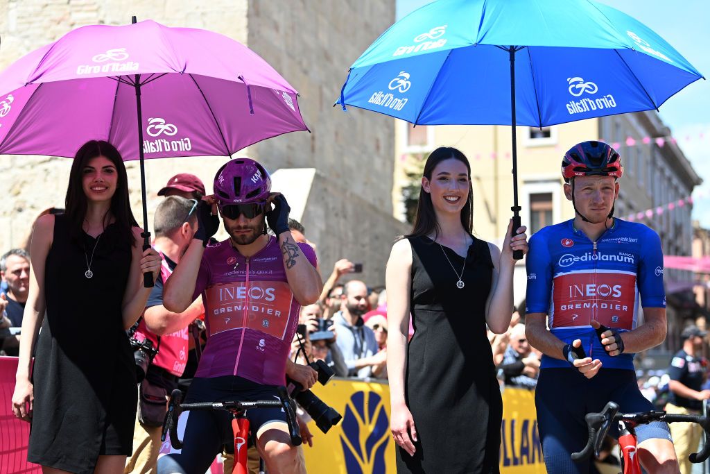 TERAMO ITALY MAY 07 LR Filippo Ganna of Italy and Team INEOS Grenadiers Purple Points Jersey and Tao Geoghegan Hart of The United Kingdom and Team INEOS Grenadiers Blue Mountain Jersey prior to the 106th Giro dItalia 2023 Stage 2 a 202km stage from Teramo to San Salvo UCIWT on May 07 2023 in Teramo Italy Photo by Tim de WaeleGetty Images