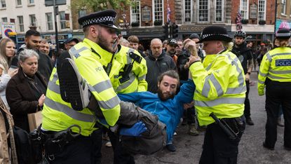 Police arrest a Just Stop Oil supporter