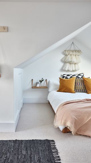 white master bedroom in a loft conversion