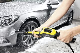 Kärcher K5 Power Control pressure washer being used on car