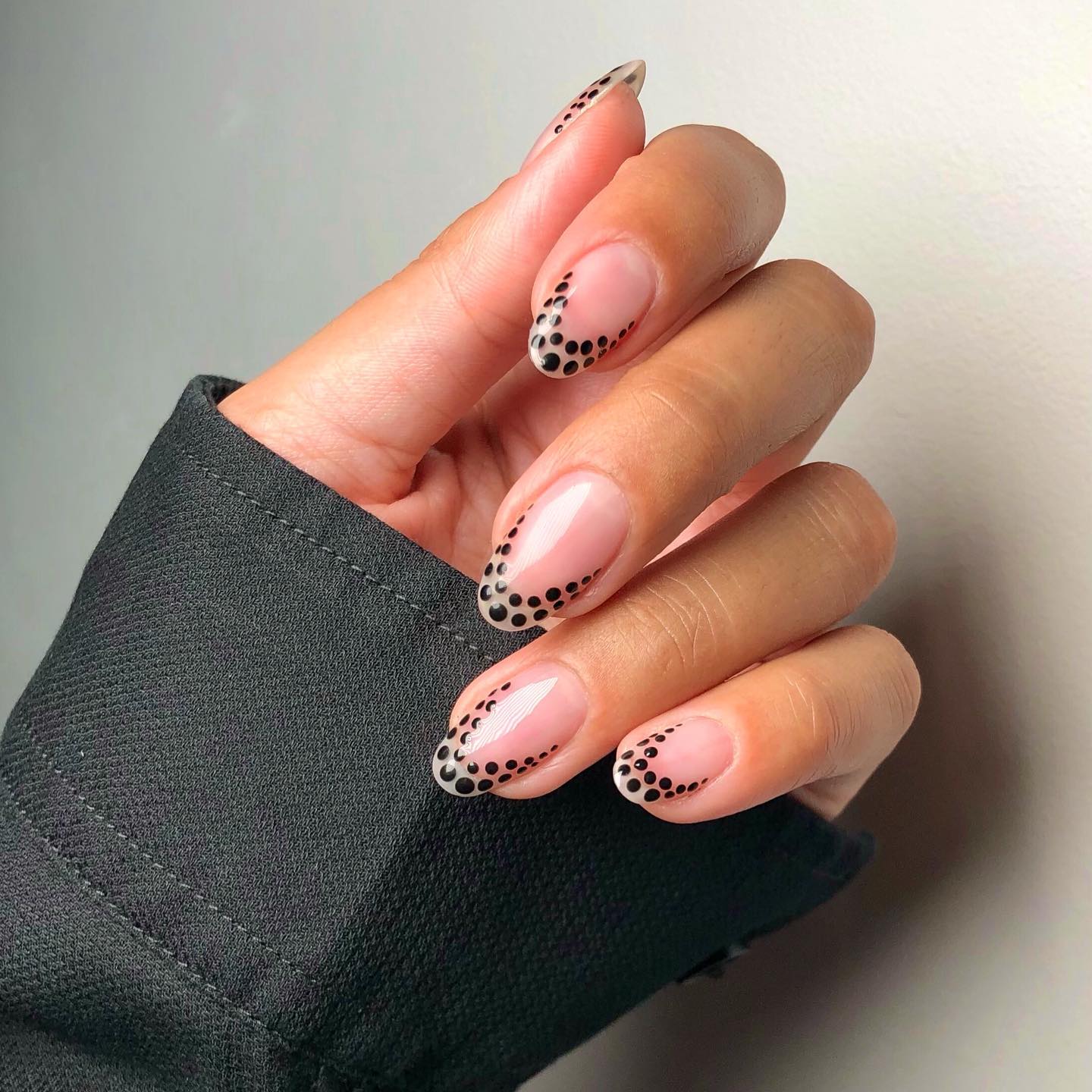 Iram Shelton black dotted French manicure
