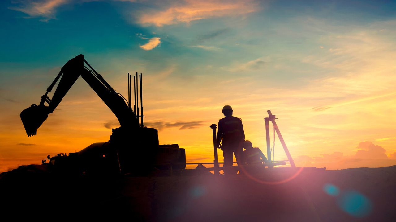 mining equipment at sunset