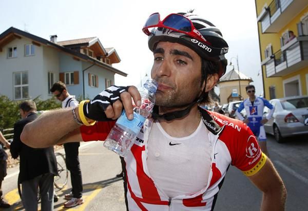 Tiago Machado (RadioShack) downs a drink after the finish of stage three.