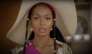 Yara Shahidi wearing a beach hat, and an expression of upset, in Grown-ish.