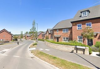 A street view of newbuild homes in Cotchett Village near Derby