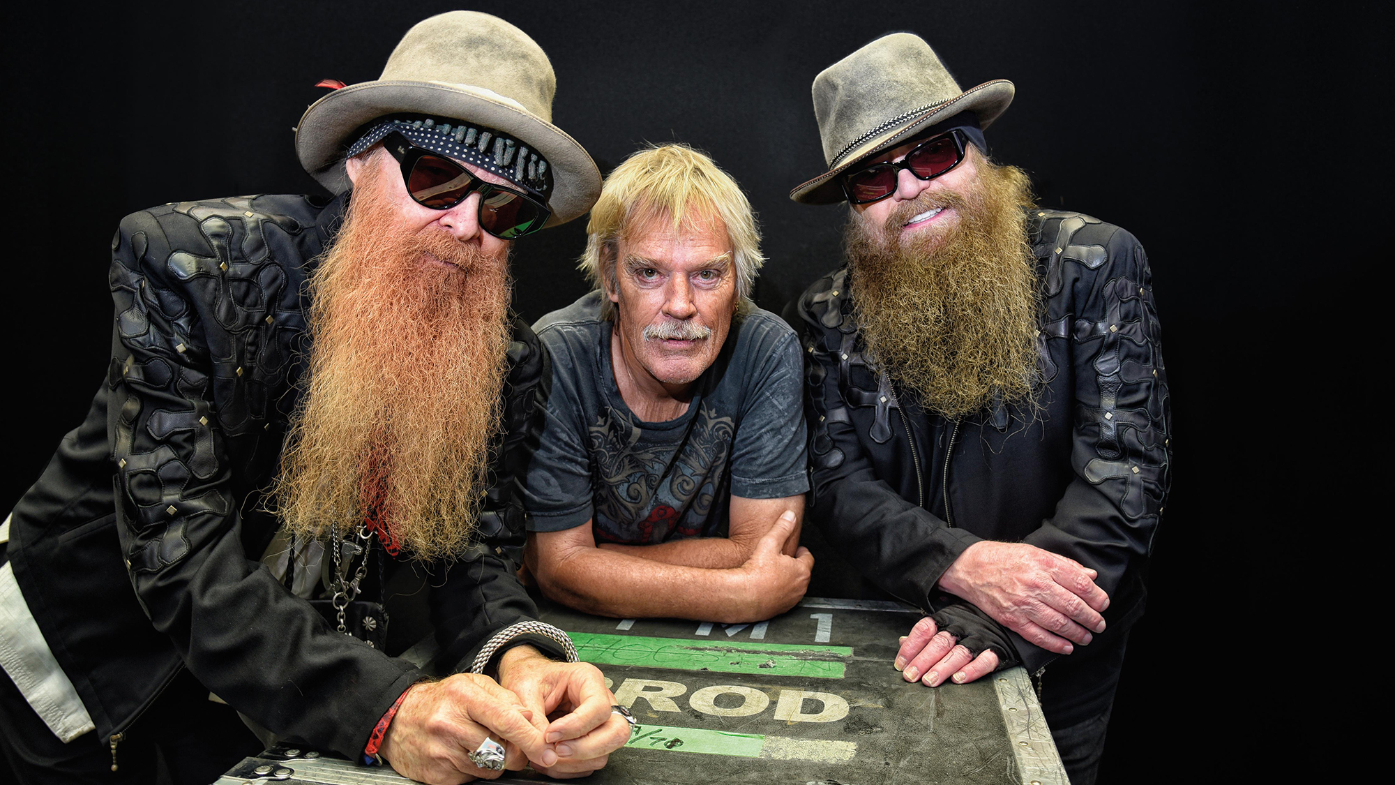 Billy Gibbons, Frank Beard and Dusty Hill of ZZ Top pose for a group portrait backstage at Glastonbury Festival, United Kingdom, 24th June 2016.