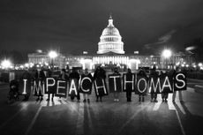 activists call for the impeachment of U.S. Supreme Court Justice Clarence Thomas outside of the U.S. Capitol Building