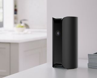 a home security hub on a countertop
