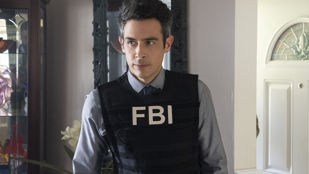 John Boyd as Scola in the FBI