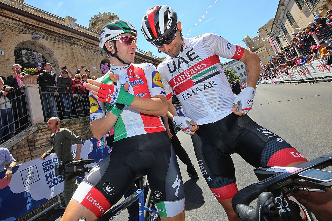 Elia Viviani and Fernando Gaviria share a few words at the Giro d'Italia