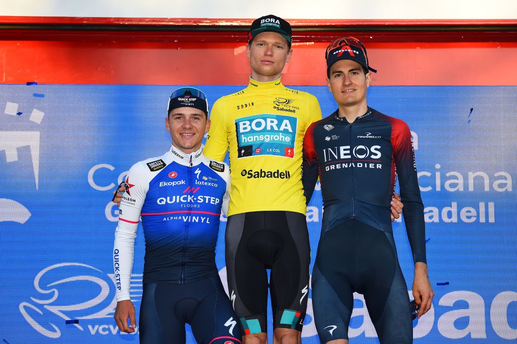VALENCIA SPAIN FEBRUARY 06 LR Remco Evenepoel of Belgium and Team QuickStep Alpha Vinyl on second place race winner Aleksander Vlasov of Russia and Team Bora Hansgrohe yellow leader jersey and Carlos Rodriguez Cano of Spain and Team INEOS Grenadiers on third place pose on the podium during the podium ceremony after the 73rd Volta A La Comunitat Valenciana 2022 Stage 5 a 92km stage from Paterna to Valencia VCV2022 on February 06 2022 in Valencia Spain Photo by Dario BelingheriGetty Images