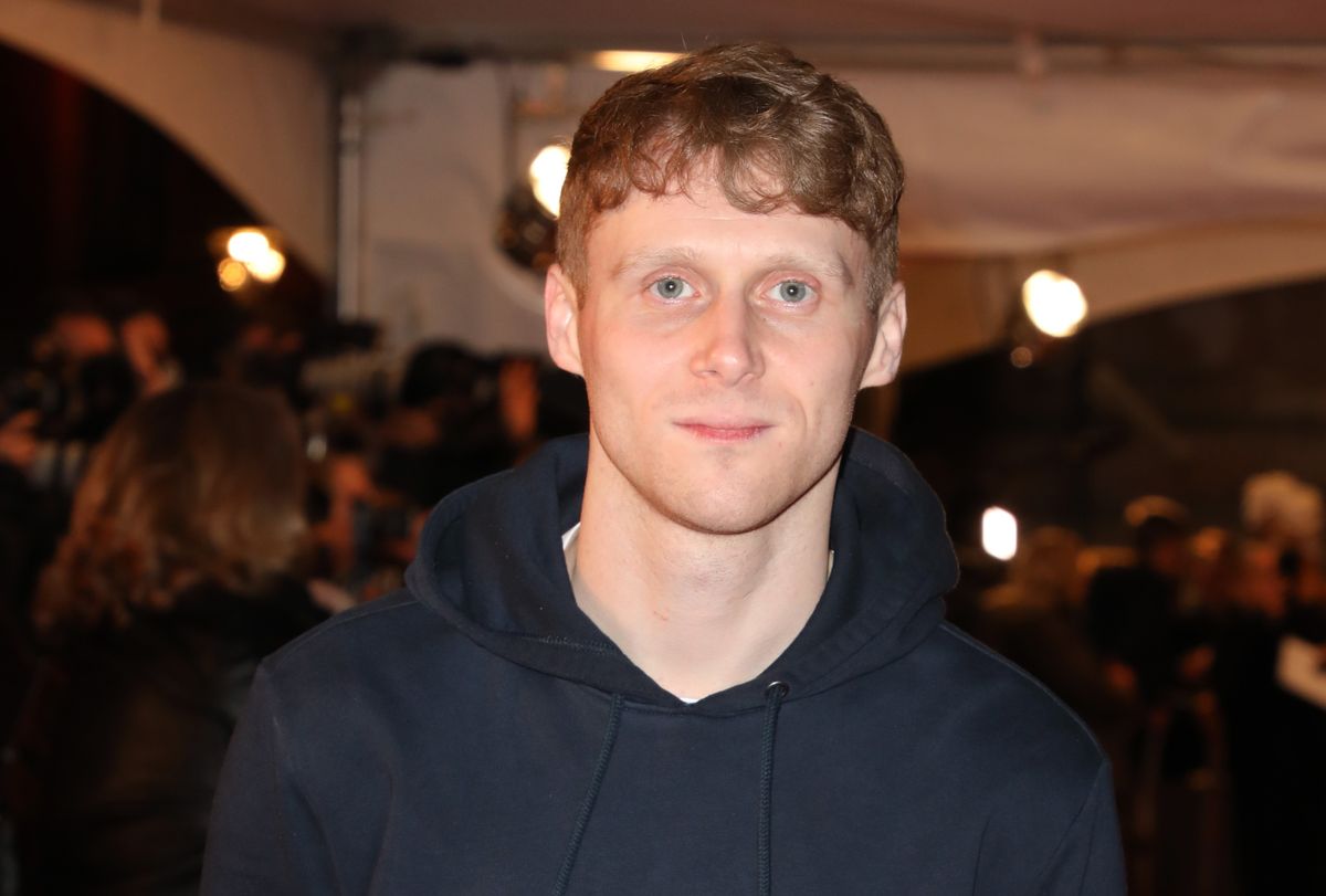 Jamie Borthwick wearing a black hoodie on the red carpet 