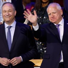 Second Gentleman Doug Emhoff and Democratic vice presidential candidate Minnesota Gov. Tim Walz during the first day of the Democratic National Convention at the United Center on August 19, 2024 in Chicago, Illinois.